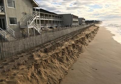 Higher-than-normal tides and a strong easterly sweep of surf earlier this week scoured the contours of the sand that had been placed between the ocean and the sandbags along the downtown Montauk beach.