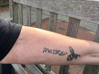 In memory of her son, Mathew, who committed suicide in 2017, Dana Lester’s tattoo pays tribute to the 17-year-old, who cared so much about bees that he planned a pollinator garden to provide them with blooms through three seasons of the year.