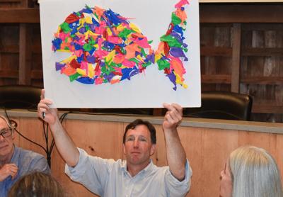 Rick Drew of the East Hampton Town Trustees held aloft a “balloon fish” made by his colleague Susan McGraw Keber.