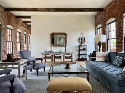 The living and dining area of penthouse 406 at the Watchcase Condominiums complex