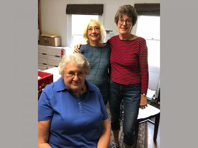 Volunteers at the Springs Library, Ethel Henn, seated, Francine Gluckman, and Jackie Wilson, are afraid the library will cease to exist unless the Springs Historical Association gets some new blood and a new state charter.