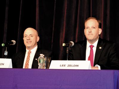 Perry Gershon, left, and Representative Lee Zeldin, right, met at the Hampton Bays High School on Monday for one of their only face-to-face debates of the campaign.