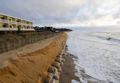 On Sunday, waves lapped at the downtown Montauk oceanfront, where erosion from recent storms has carried away sand and exposed the sandbags beneath it. A Montauk hamlet study recommends coastal retreat for oceanfront motels and a gradual shift to higher ground.