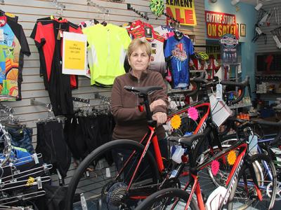 Pamela McDonald stood amid the remaining inventory at Bermuda Bikes in East Hampton last month. She and her husband, Kent, are selling the store after nearly 40 years.