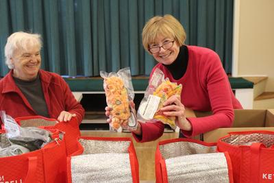 At the Springs Food Pantry last week, Deanna Tikkanen and Pamela Bicket helped unload bags of frozen vegetables produced through a partnership with the Amagansett Food Institute’s South Fork Kitchens and Share the Harvest Farm.