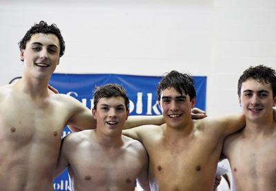 East Hampton’s state qualifiers in the 200-meter freestyle relay, from left, Ethan McCormac, Ryan Duryea, Aidan Forst, and Owen McCormac