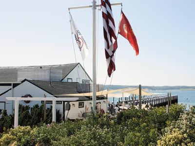 The Town of East Hampton and Marc Rowan, the billionaire co-founder of the private equity firm Apollo Global Management who bought Perry B. Duryea & Son Inc., the wholesale-retail fish market with dining on Fort Pond Bay in Montauk, have settled a lawsuit.