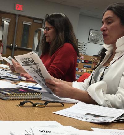 Danielle Laibowitz, left, and Tanya Rulon-Miller of SAFE in Sag Harbor reviewed some educational materials about substance abuse at the group’s most recent meeting at Pierson High School.