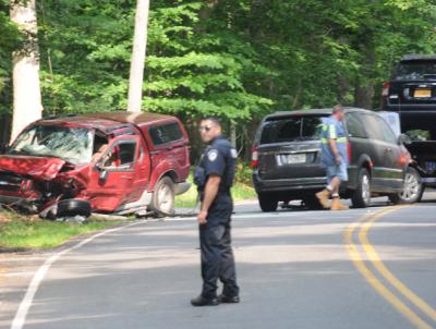 The East Hampton Fire Department extinguished a fire under the hood of the minivan involved in a two-car accident on Cedar Street in East Hampton on Monday morning.