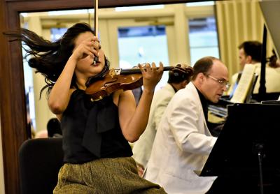 At one of last year’s Bridgehampton Chamber Music Festival concerts, Kristin Lee demonstrated some rigorous violin playing while Orion Weiss was at the piano.