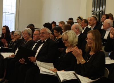 The Choral Society of the Hamptons during a warm up session