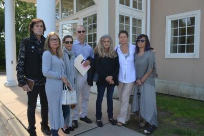 About 40 friends and fellow Ross School parents showed up last Thursday at East Hampton Town Justice Court to support of Arthur W. Bijur of Amagansett, center, who was arraigned on a charge that he violated the Suffolk County Social Host Law, which prohibits adults from allowing underage drinking at their residences.