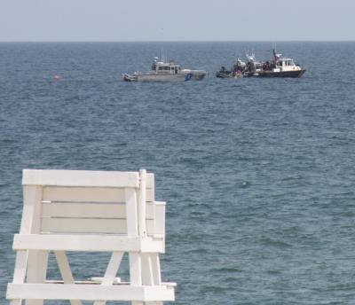 Boats searched the waters near the crash site off Indian Wells Beach on June 8, the day the plane's wreckage was found.