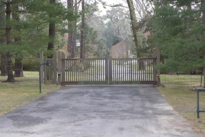 The main entrance to Ronald Perelman's Creeks property in East Hampton, where a number of buildings were altered without the required village approvals.