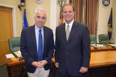 Steven E. Skrynecki, right, will not start working full time as the Southampton Town police chief until mid-March, an arrangement that Supervisor Jay Schneiderman said will save the town money.