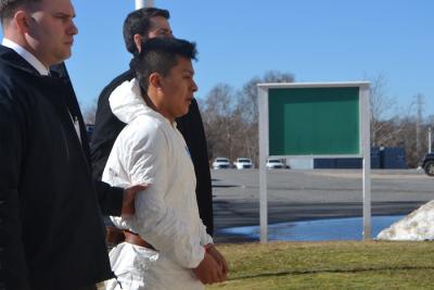 Bryan Siranaula was led into East Hampton Town Justice Court, where a judge set bail at $205,000.