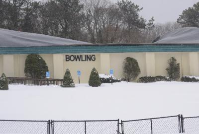 Part of East Hampton Bowl's roof collapsed under the weight of the snow at the end of January. The building will be demolished soon to make way for new retail space.