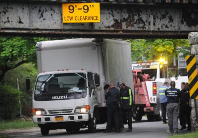 A box truck became wedged under the Accabonac Road overpass on Thursday afternoon, the second such bridge strike this week.