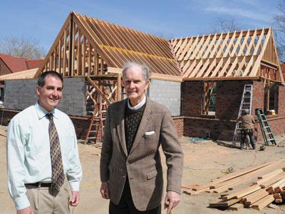 Dennis Fabiszak, East Hampton Library’s director, and Donald Hunting, president of the library’s board of managers, outside the 6,800-square-foot expansion, presently under construction.