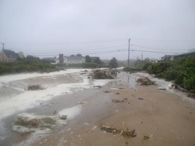 At the height of the storm, the ocean flowed into the Ditch Plain community through the town parking lot at the East Deck Motel.