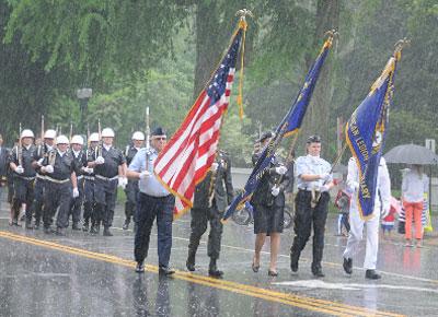 Marchers in the East Hampton Memorial Day parade were undaunted by heavy rain.