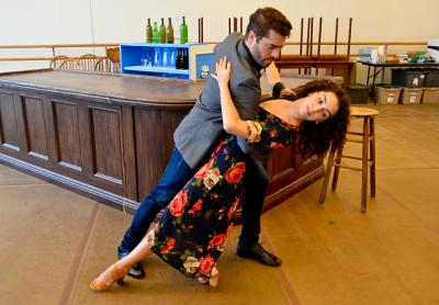 Omar Lopez-Cepero as Juan Peron and Arianna Rosario as Eva Peron perform a tango in Bay Street Theater’s production of “Evita.”