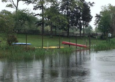 High water encroached on a lawn at Georgica Pond in East Hampton on Thursday afternoon