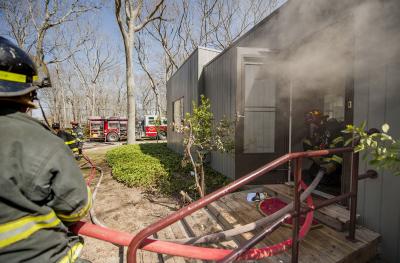 Smoke was coming up through the floor from the basement for at least a half-hour before firefighters were called to 162 Noyac Path in Water Mill.