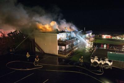 A building at Hartman’s Briney Breezes in Montauk was engulfed in flames when firefighters arrived at about 4:30 a.m. on Friday.