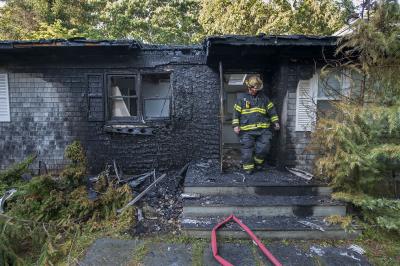 The front of 52 Cedar Drive is completely charred.