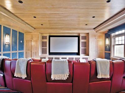 A cozy home theater at Rose Hill Point, a property in Water Mill listed by Gary DePersia of Corcoran for $32.95 million