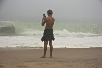 A beachgoer stopped for a photograph at Indian Wells in Amagansett on Saturday afternoon.