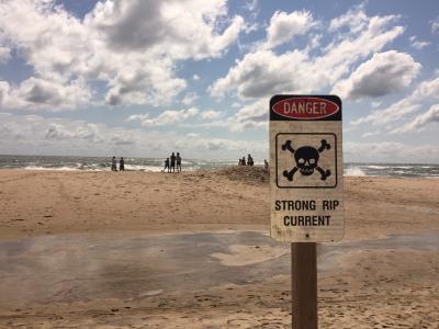 Beaches were closed to swimming due to dangerous rip currents.