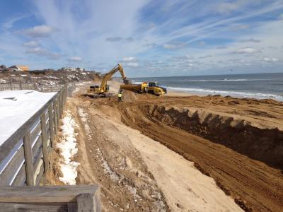 An Army Corps contractor building a sandbag seawall along the downtown Montauk ocean shoreline has reached the eastern end of the project's area.