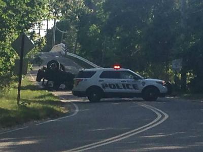 Police blocked Cranberry Hole Road after a Jeep rolled onto its roof, seriously injuring its driver.