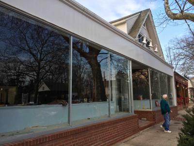 Joe LaCarrubba left the building he owns with his brother Sal LaCarrubba on Friday. The building has been divided into two spaces.