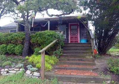 At Lazy Point in Amagansett, residents own their houses but not the land they sit on. Swapping annual leasues for longer ones could give them a greater sense of security.