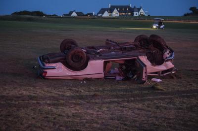 The driver of a Mercedes lost control and the car rolled over, landing near the eighth hole at the Maidstone Club Saturday night.