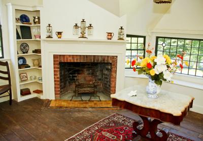 The master bedroom will be completely restored with period furniture and decorative objects. The two pitchers on the fireplace mantel were brought from Scotland by Mary Nimmo Moran.