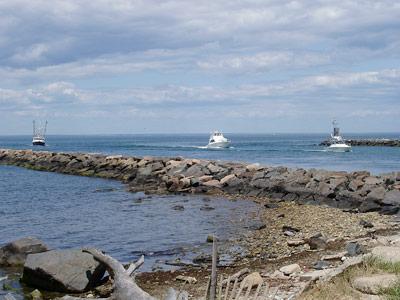 East Hampton Town officials will tell the Army Corps of Engineers to proceed with a plan to dredge the Montauk inlet, create a new public beach to the west, and install several groins along the shoreline.