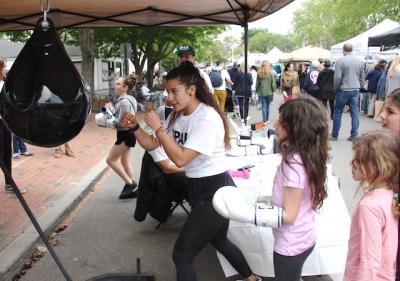 Newtown Lane in East Hampton was filled with visitors last year during a first-ever street fair. The fair will return on May 12.