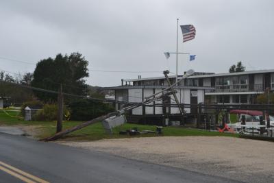 Winds caused damaged to several utility poles by Snug Harbor Inn in Montauk during Sunday night's storm.