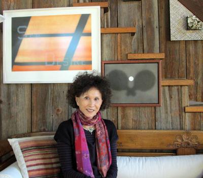 Lana Jokel sat recently in her Bridgehampton house beneath two works by Ed Ruscha.