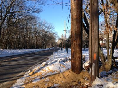 New poles have already gone up next to existing, shorter ones on much of the route, including on Town Lane in East Hampton