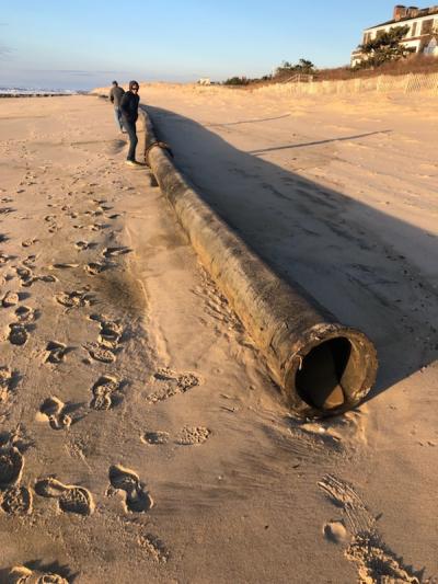 A hydraulic dredge pipe washed up on Georgica Beach Friday after a heavy rain storm on Thursday.