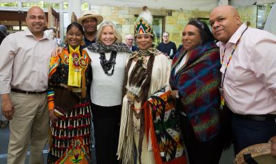 Courtney Sale Ross, the Ross School founder, with members of the Shinnecock Indian Nation at a celebration in her honor at the Ross School.