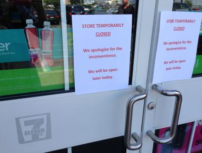 A sign on the door of the Sag Harbor 7-Eleven Monday promised that it would reopen soon.