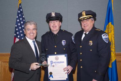 David Driscoll, center, the Sag Harbor Police Department’s 2012 officer of the year, with Suffolk County Executive Steve Bellone, left, and Chief Tom Fabiano