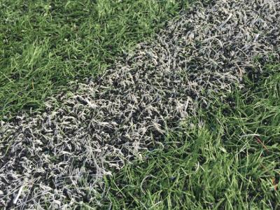 A close-up of the artificial turf field at East Hampton High School