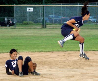 Theresa Schirrippa, P.B.A.’s third baseman, vaulted over the team’s usually flawless shortstop, Mylan Le, to keep a Groundworks bouncer in the infield during Aug. 7’s game.